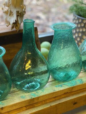 Grønne flasker lavet af genbrugsglas